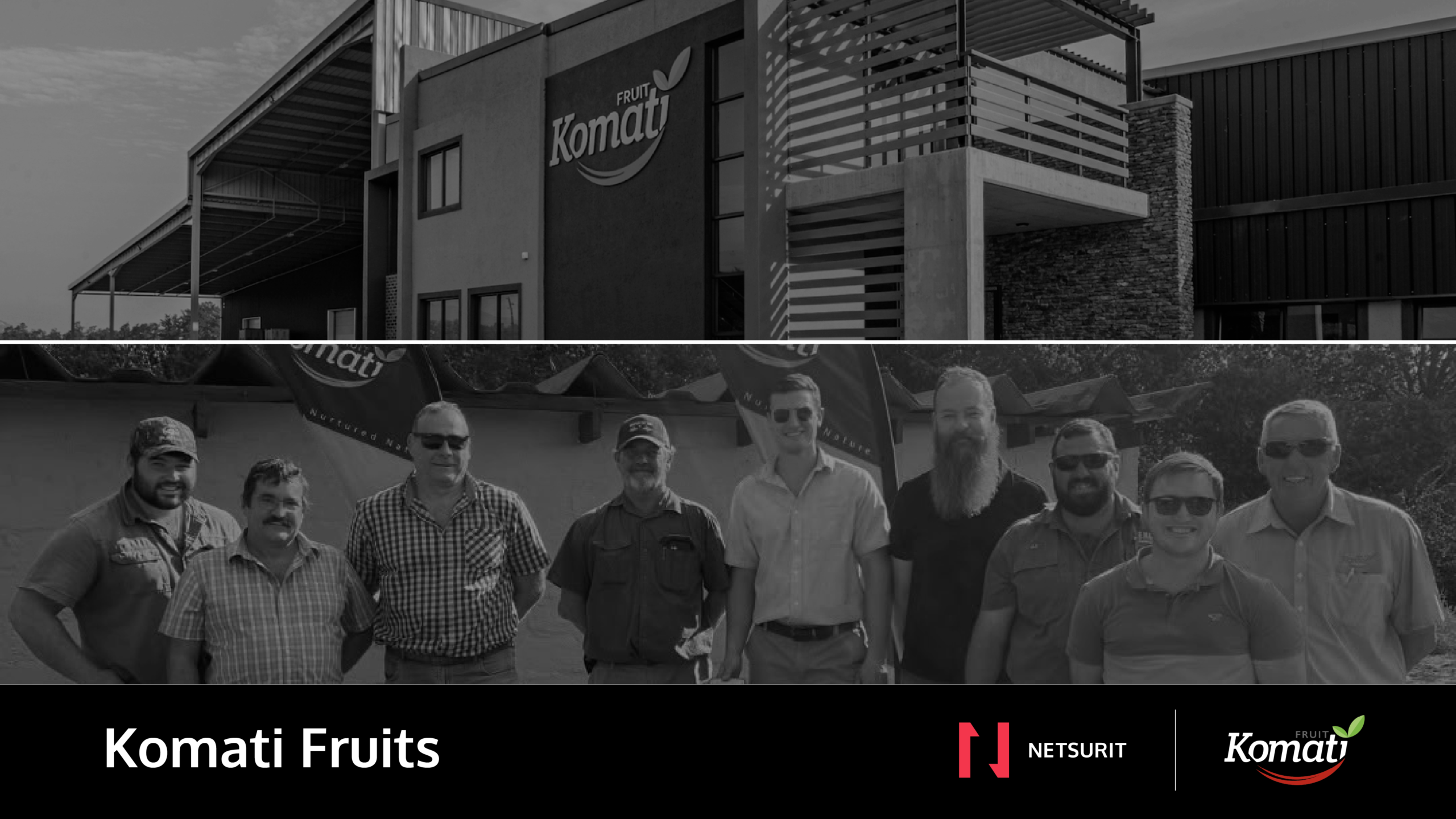 Black-and-white group photo of employees posing outside the Komati Fruits facility.