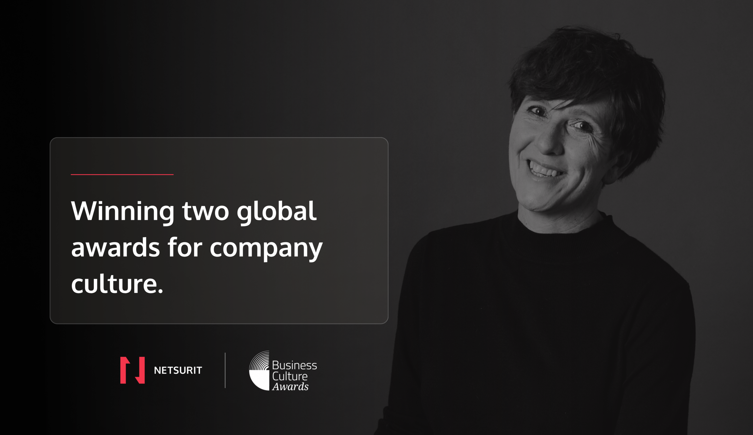 A woman smiling on a hero image with a text saying: Winning two global awards for company culture" with Netsurit and Business Culture Awards logo at the bottom.